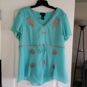 Gorgeous turquoise blouse
